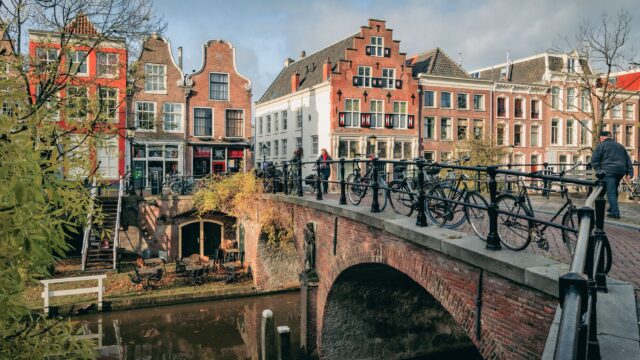 Bridge over the Oude Gracht in Utrecht with a few of historic houses